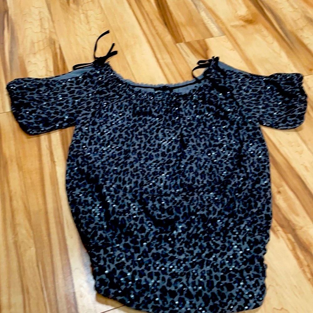 Women’s express top sparkly with animal print